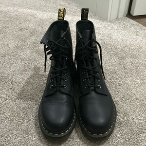 Woman’s black Dr. Martins